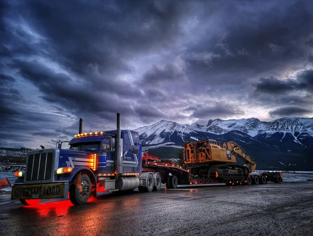 Carrier Partners Heavy Haul Truck In Mountains Carrier Partners Heavy Haul Truck In Mountains