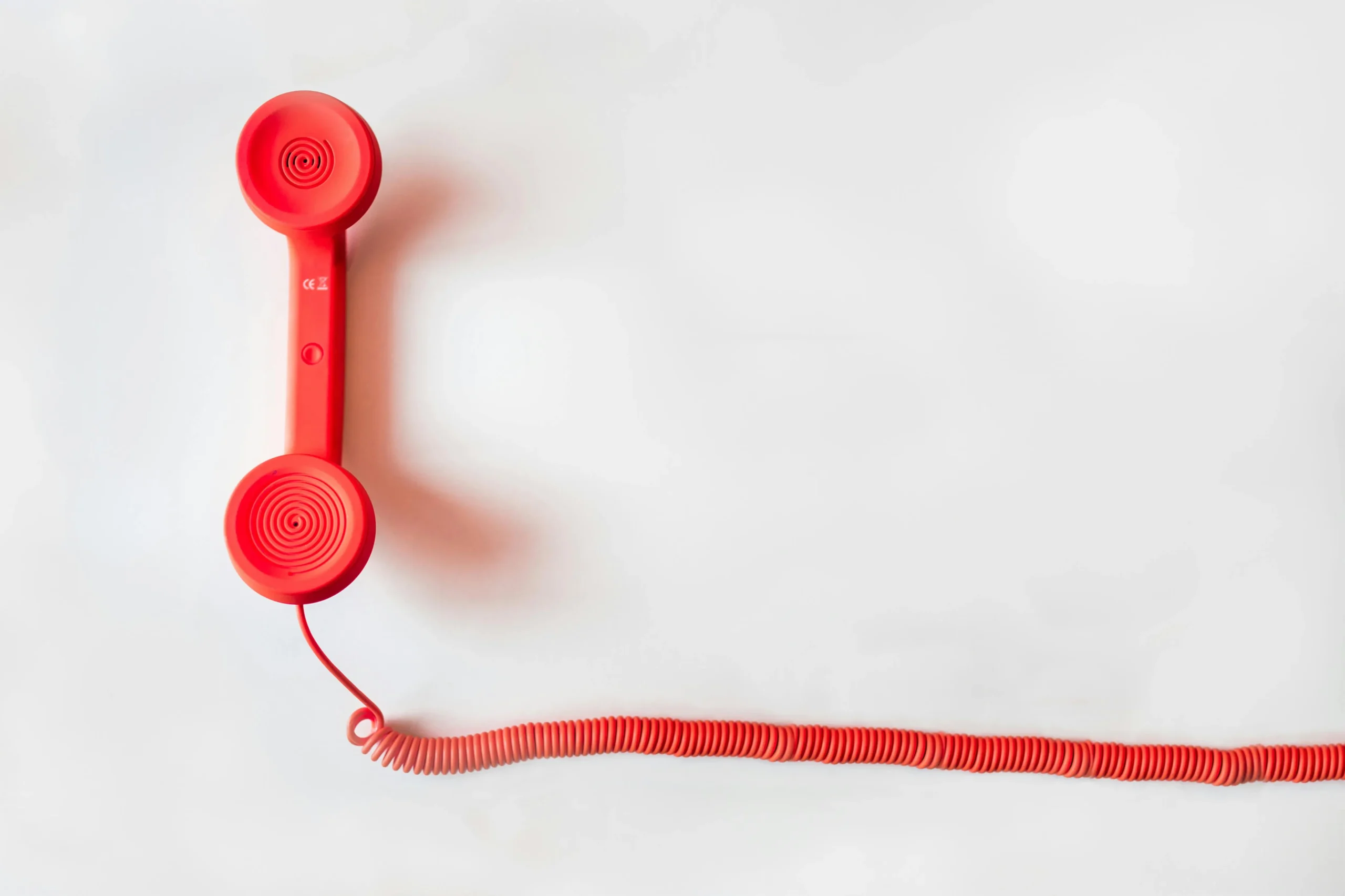 Red telephone with cord Red telephone with cord