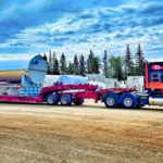 Bowline truck hauling Energy Sector equipment on a trailer in Western Canada.